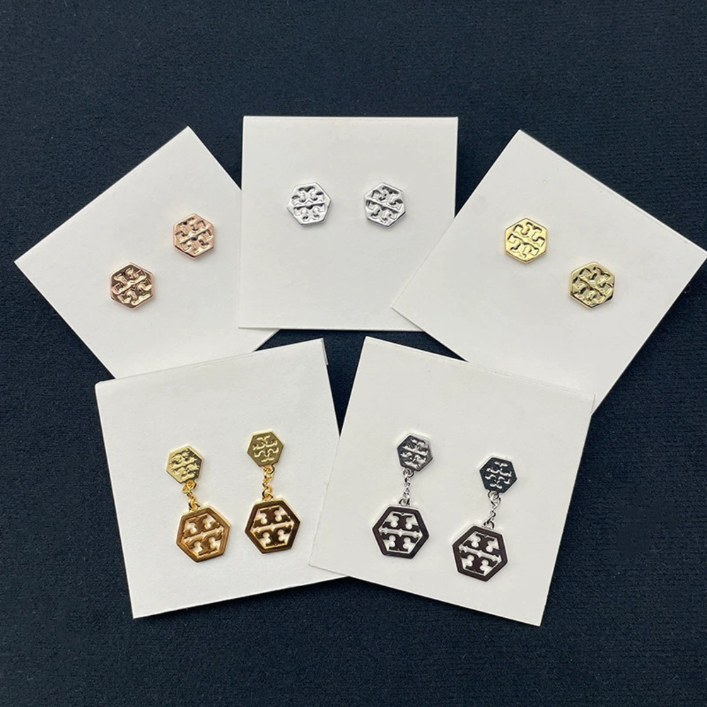 Tory Burch Pair of Gold Plated Geometric Hexagon Letter Stud Earrings